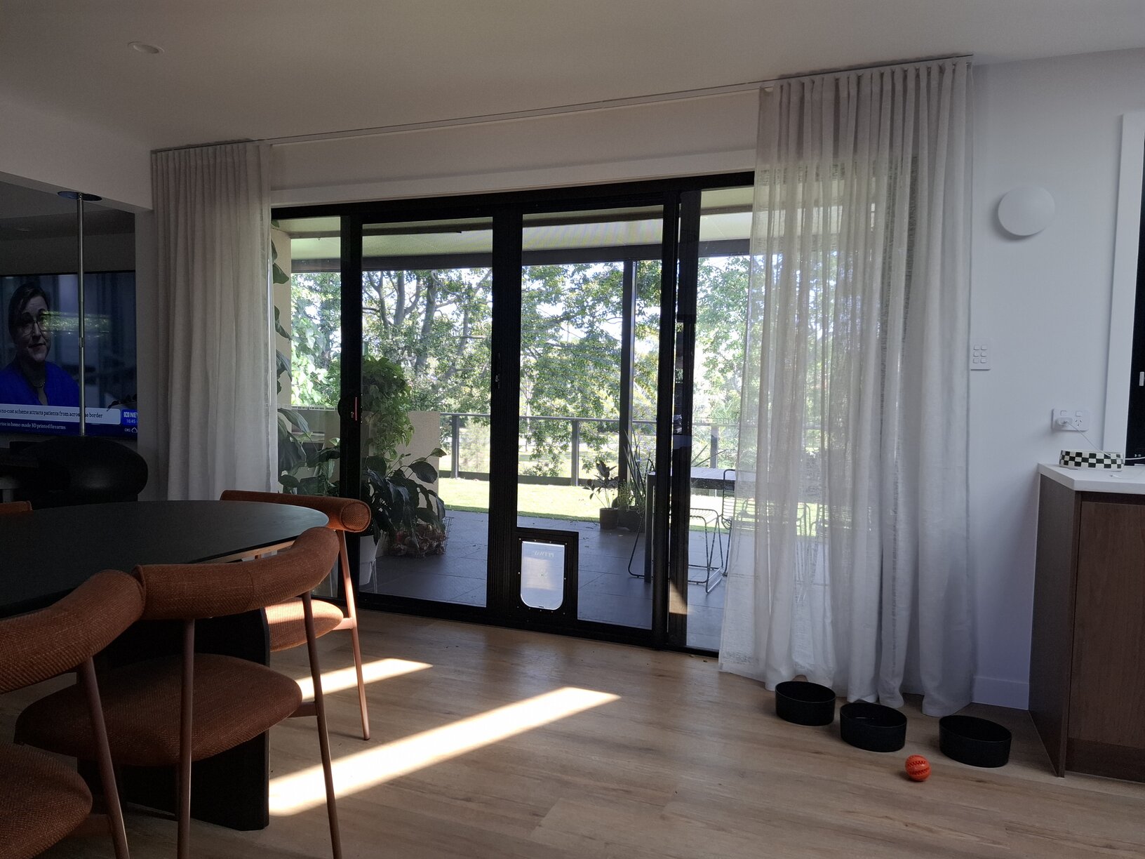 Insect door screen installation on Gold Coast home