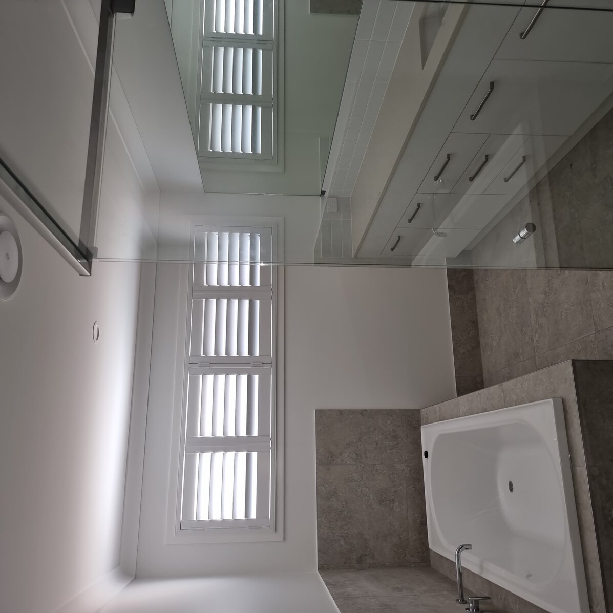 Internal PVC plantation shutter close-up showing adjustable louvres