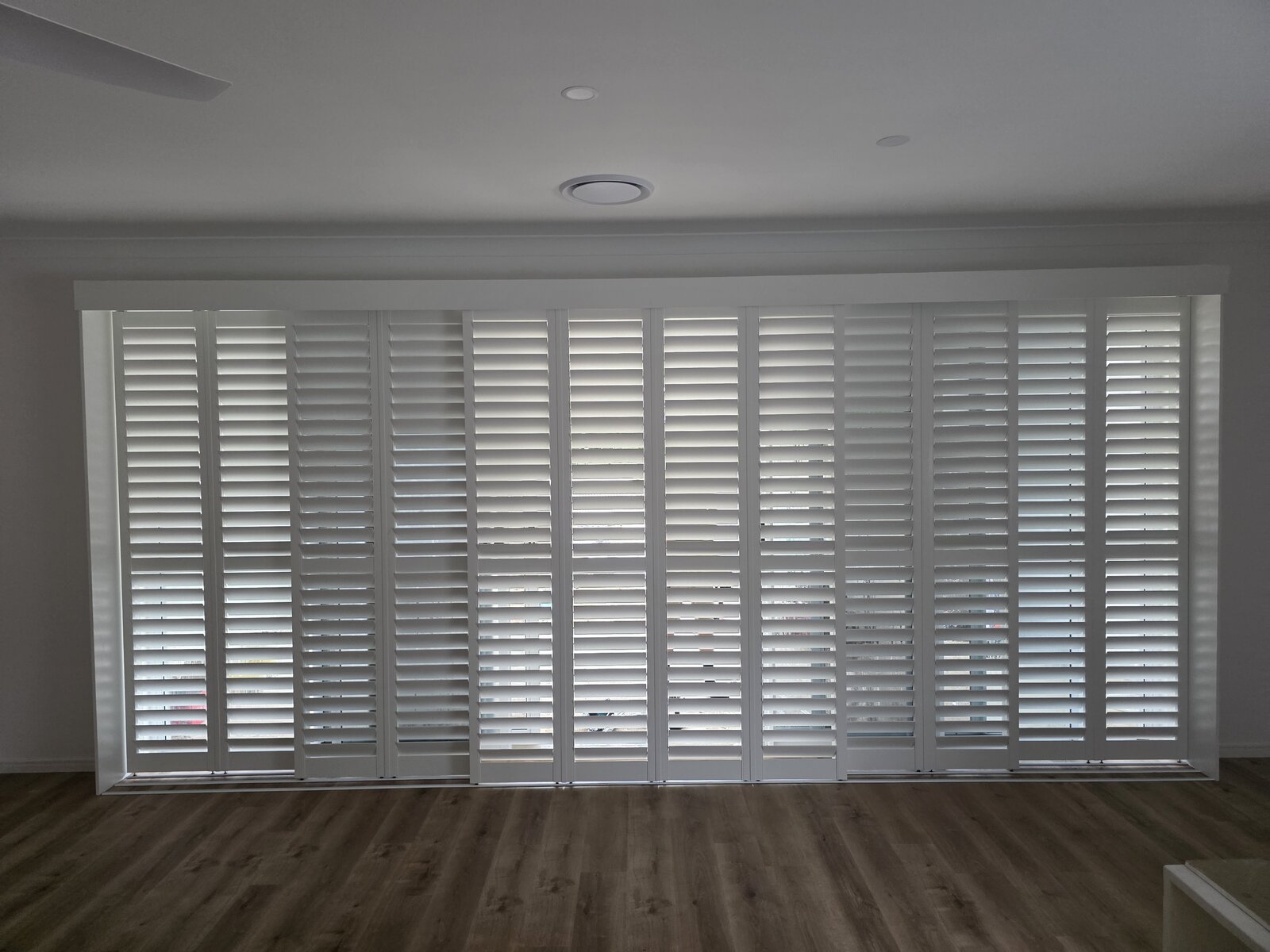 External aluminium shutter close-up showing adjustable louvre detail